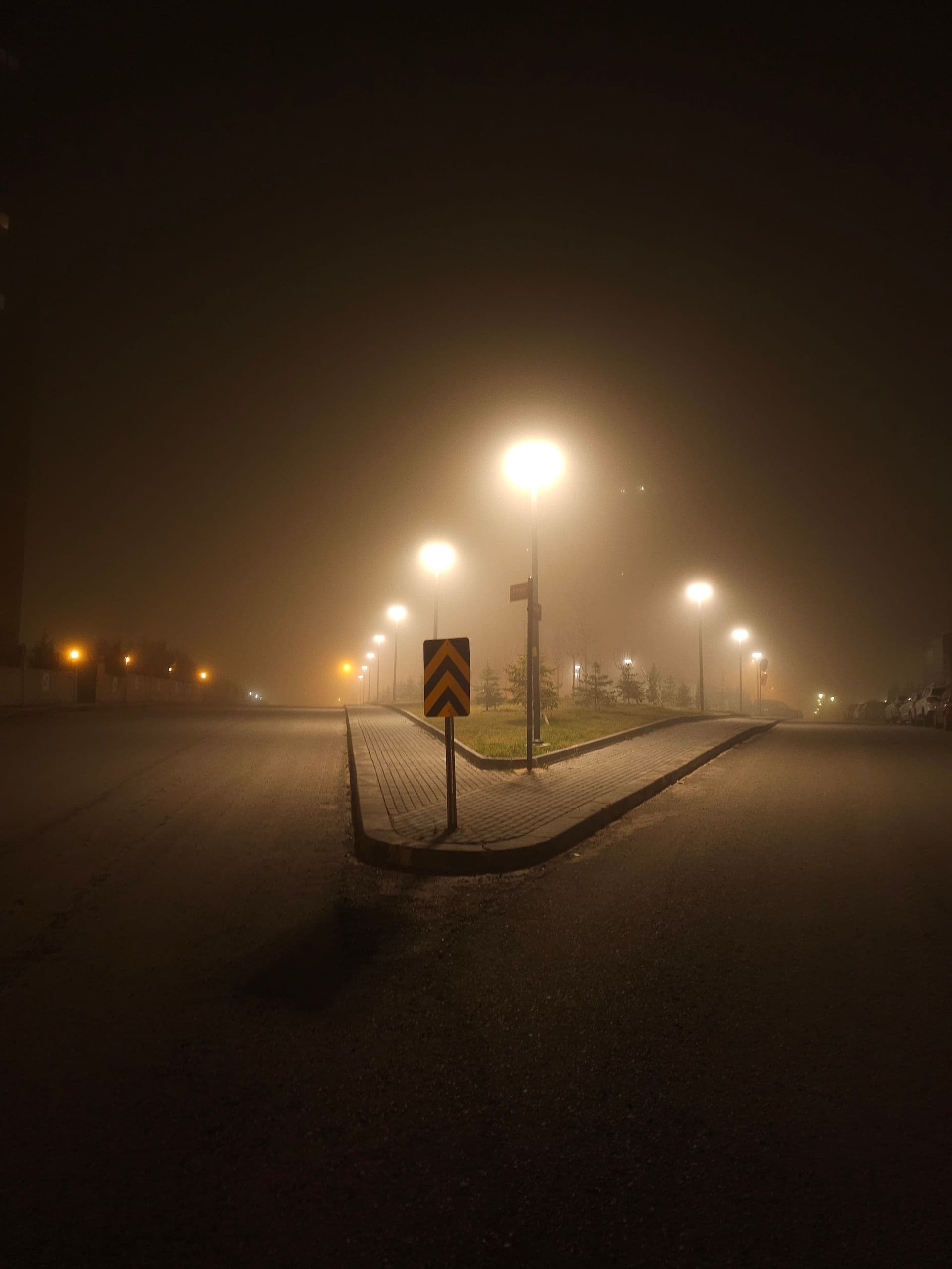 Misty street at night in Eeklo